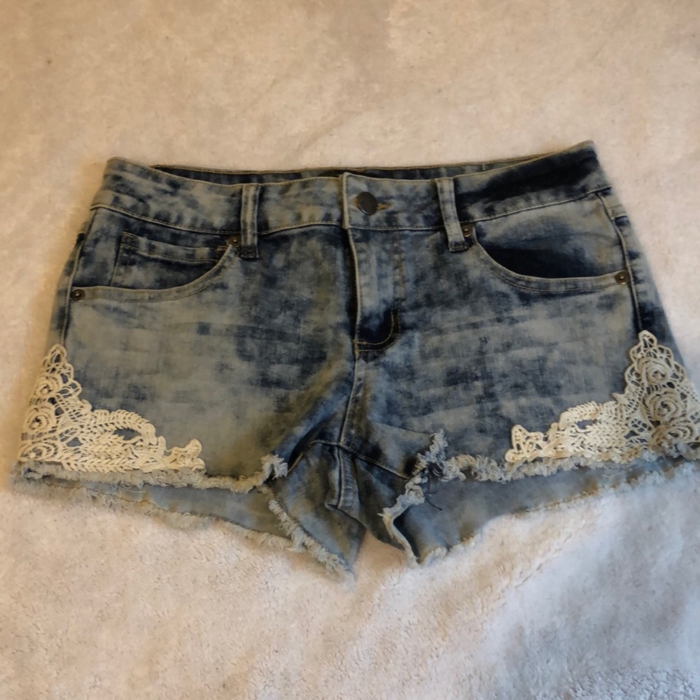 Light blue shorts, size 7, brand Threar Market.